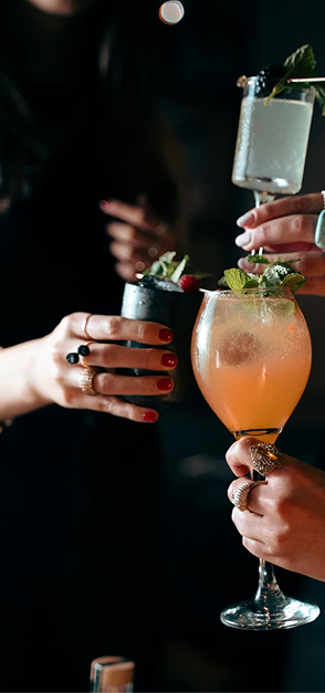 Friends enjoying cocktails
